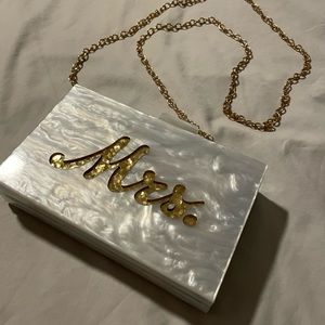 Hard rectangular “Mrs” purse